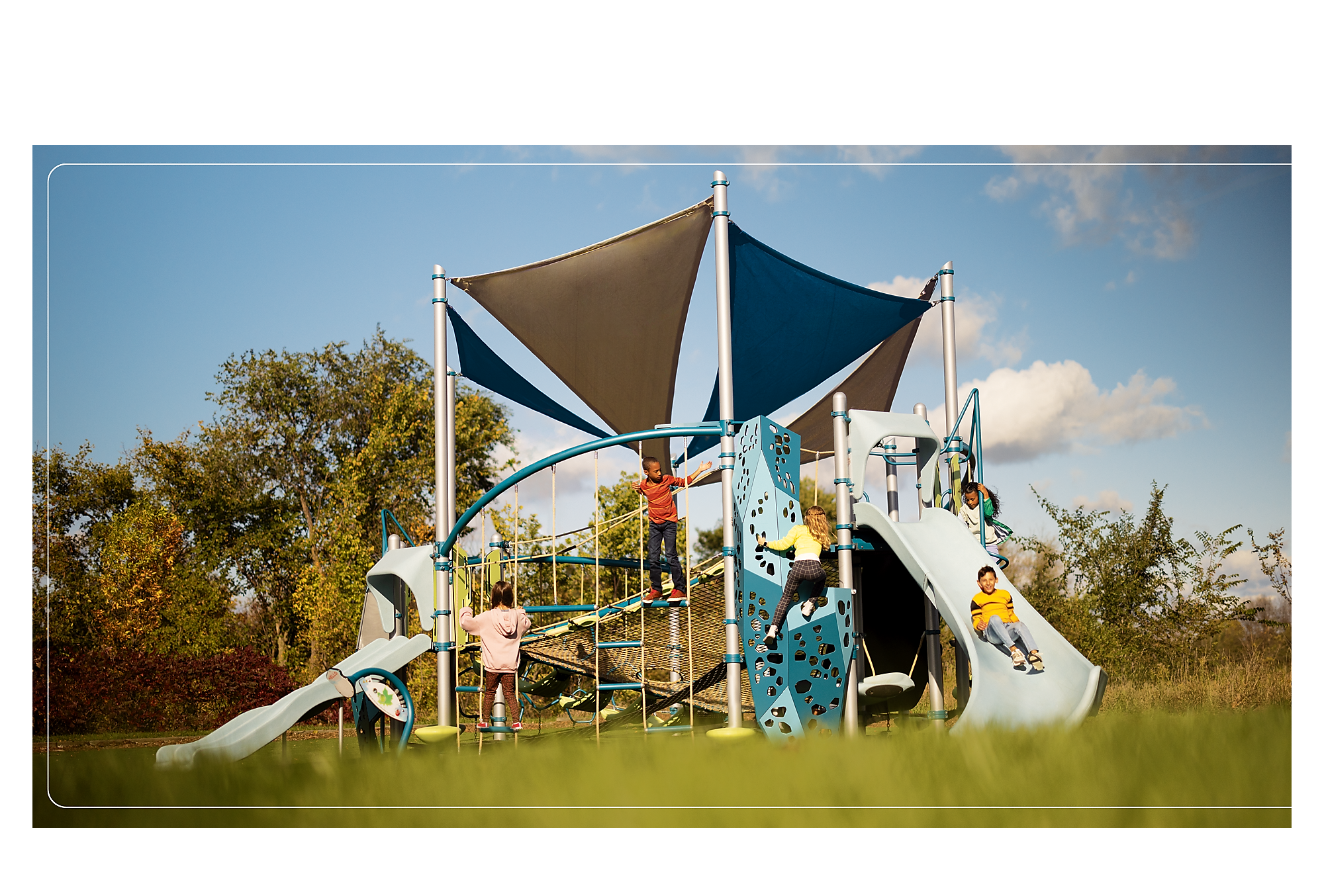 Children playing on playground with shade sails