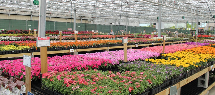 Patio tables full of flowers at the Green Acres in Melissa, Texas